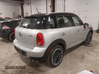 2015 MINI Countryman z VIN WMWZB3C59FWR46546, wystawiony jako IAAI lot #41687489 z przebiegiem 95 734 mil mil oraz . Historia ofert i sprzedaży dostępna na DreamBid. Obrazek 4.