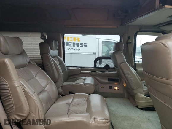 2001 Ford Econoline Cargo Recreational with VIN 1FDPE24L51HB59174, listed as a Copart auction lot 84857404 with 129,690 mi miles and Salvage Title. Bid and sale history available at DreamBid. Image 11.