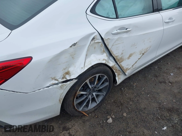 2019 Acura TLX z VIN 19UUB3F33KA007148, wystawiony jako IAAI lot #41889013 z przebiegiem 97 654 mil mil oraz . Historia ofert i sprzedaży dostępna na DreamBid. Obrazek 6.