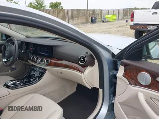 2018 Mercedes-Benz E 300 with VIN WDDZF4KB3JA385504, listed as a IAAI auction lot 42340289 with 15,336 mi miles and . Bid and sale history available at DreamBid. Image 5.