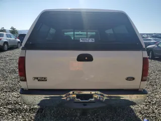 2004 Ford F-150 XL with VIN 2FTRF18W54CA36334, listed as a Copart auction lot 63464375 with 253,805 mi miles and Salvage title. Bid and sale history available at DreamBid. Image 6.