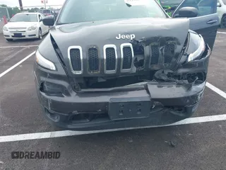 2015 Jeep Cherokee Latitude with VIN 1C4PJLCB5FW689811, listed as a IAAI auction lot 42113567 with 113,740 mi miles and . Bid and sale history available at carsss.com. Image 6.