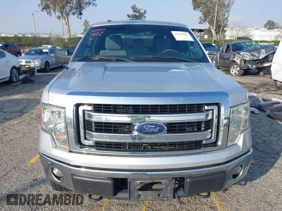 2014 Ford F-150 XL with VIN 1FTFW1EF9EKF99892, listed as a IAAI auction lot 41428456 with 128,659 mi miles and . Bid and sale history available at carsss.com. Image 13.