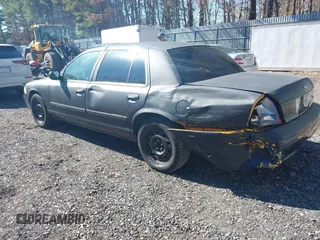 2011 Ford Crown Victoria with VIN 2FABP7AV9BX121739, listed as a IAAI auction lot 41763311 with 215,727 mi miles. Bid and sale history available at carsss.com. Image 3.
