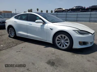 2017 Tesla Model S 60 with VIN 5YJSA1E16HF198903, listed as a Copart auction lot 60601565 with Not provided miles and Clean title. Bid and sale history available at DreamBid. Image 4.