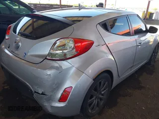 2012 Hyundai Veloster w/Black Int z VIN KMHTC6AD2CU052067, wystawiony jako IAAI lot #42261316 z przebiegiem 187 234 mil mil oraz . Historia ofert i sprzedaży dostępna na DreamBid. Obrazek 6.