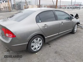 2006 Honda Civic LX with VIN 2HGFA16586H507296, listed as a IAAI auction lot 42101001 with 144,781 mi miles and . Bid and sale history available at DreamBid. Image 4.