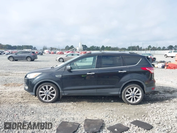 2014 Ford Escape SE with VIN 1FMCU0G9XEUE35271, listed as a IAAI auction lot 40896477 with 139,444 mi miles. Bid and sale history available at carsss.com. Image 14.