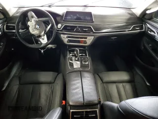2019 BMW 7 Series 740i z VIN WBA7E2C57KB454012, wystawiony jako Copart lot #50977775 z przebiegiem Nie podano mil oraz Szkoda całkowita • Salvage title. Historia ofert i sprzedaży dostępna na DreamBid. Obrazek 8.