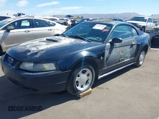 2001 Ford Mustang Standard with VIN 1FAFP40471F153561, listed as a IAAI auction lot 41650428 with 170,886 mi miles. Bid and sale history available at carsss.com. Image 17.