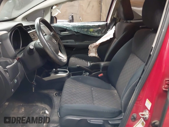 2016 Honda Fit LX with VIN JHMGK5H50GX003602, listed as a IAAI auction lot 42317398 with 58,612 mi miles and . Bid and sale history available at DreamBid. Image 5.