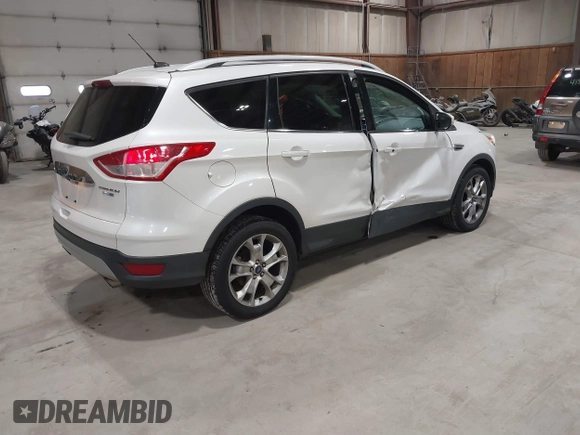 2016 Ford Escape Titanium with VIN 1FMCU9J95GUB02377, listed as a IAAI auction lot 41869557 with 88,441 mi miles. Bid and sale history available at carsss.com. Image 4.