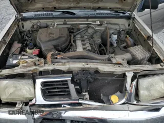 2000 Nissan Frontier XE z VIN 1N6DD26S6YC415423, wystawiony jako Copart lot #59086535 z przebiegiem 122 746 mil mil oraz Szkoda całkowita • Salvage title. Historia ofert i sprzedaży dostępna na DreamBid. Obrazek 11.