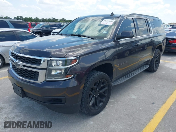 2015 Chevrolet Suburban LT z VIN 1GNSKJKC9FR245097, wystawiony jako IAAI lot #42468168 z przebiegiem 198 454 mil mil oraz . Historia ofert i sprzedaży dostępna na DreamBid. Obrazek 18.