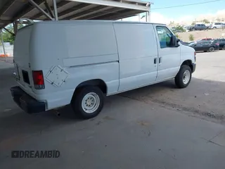 2010 Ford Econoline Cargo Commercial with VIN 1FTNE1EW4ADA91939, listed as a IAAI auction lot 42156334 with 311,000 mi miles and . Bid and sale history available at DreamBid. Image 4.