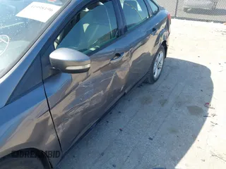 2013 Ford Focus SE with VIN 1FADP3F27DL156733, listed as a IAAI auction lot 41998196 with 116,692 mi miles. Bid and sale history available at carsss.com. Image 6.