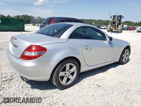 2007 Mercedes-Benz SLK 280 with VIN WDBWK54F47F158590, listed as a Copart auction lot 57837415 with 128,259 mi miles and Salvage title. Bid and sale history available at DreamBid. Image 3.