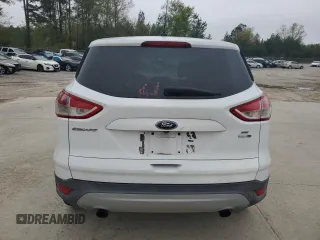 2014 Ford Escape SE with VIN 1FMCU9GX8EUA54151, listed as a Copart auction lot 51424195 with 173,161 mi miles and Salvage title. Bid and sale history available at DreamBid. Image 6.