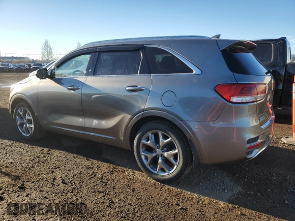 2016 Kia Sorento SXL z VIN 5XYPKDA15GG105354, wystawiony jako Copart lot #79710674 z przebiegiem 167 327 mil mil oraz Czysty tytuł • Clean title. Historia ofert i sprzedaży dostępna na DreamBid. Obrazek 2.