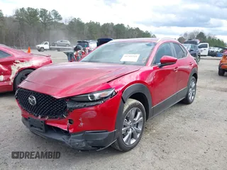 2024 Mazda CX-30 S Carbon Edition with VIN 3MVDMBCM6RM627083, listed as a IAAI auction lot 41715241 with 23,855 mi miles and . Bid and sale history available at DreamBid. Image 2.