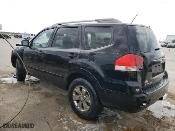 2009 Kia Borrego EX with VIN KNDJJ741295021249, listed as a Copart auction lot 82643094 with 209,580 mi miles and Salvage Title. Bid and sale history available at carsss.com. Image 2.