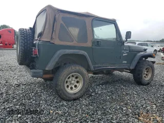 1998 Jeep Wrangler Sport with VIN 1J4FY19S5WP795781, listed as a Copart auction lot 59718065 with 208,416 mi miles and Salvage title. Bid and sale history available at DreamBid. Image 3.