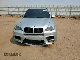 2011 BMW X5 M with VIN 5YMGY0C58BLK26357, listed as a Copart auction lot 71443774 with 116,973 mi miles and Salvage Title. Bid and sale history available at carsss.com. Image 12.