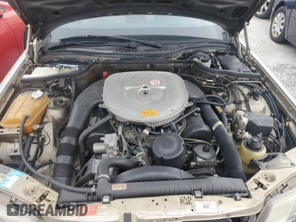 1989 Mercedes-Benz 560 with VIN WDBCA39E1KA479955, listed as a Copart auction lot 76202804 with 132,546 mi miles and Salvage Title. Bid and sale history available at DreamBid. Image 11.