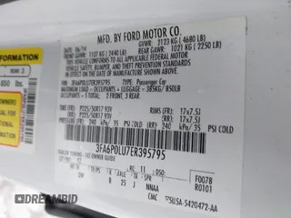 2014 Ford Fusion SE Hybrid with VIN 3FA6P0LU7ER395795, listed as a IAAI auction lot 41515505 with 58,037 mi miles. Bid and sale history available at carsss.com. Image 9.