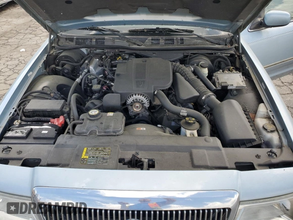 2005 Mercury Grand Marquis GS z VIN 2MEFM74W45X611002, wystawiony jako Copart lot #56645615 z przebiegiem 141 059 mil mil oraz Tytuł czysty. Historia ofert i sprzedaży dostępna na DreamBid. Obrazek 11.