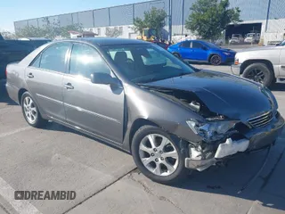 2005 Toyota Camry LE with VIN 4T1BF30K55U619313, listed as a IAAI auction lot 41854001 with 89,982 mi miles and . Bid and sale history available at DreamBid. Image 1.
