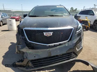 2023 Cadillac XT5 AWD Sport with VIN 1GYKNGRS8PZ100581, listed as a Copart auction lot 55157035 with 14,637 mi miles and Salvage title. Bid and sale history available at DreamBid. Image 5.