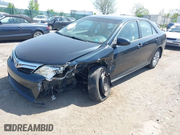 2012 Toyota Camry L with VIN 4T1BF1FK0CU599819, listed as a IAAI auction lot 42158719 with 130,038 mi miles. Bid and sale history available at carsss.com. Image 2.