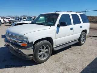 2006 Chevrolet Tahoe LS with VIN 1GNEC13V36R143059, listed as a IAAI auction lot 41727459 with 230,849 mi miles. Bid and sale history available at carsss.com. Image 2.