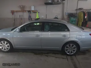 2005 Toyota Avalon XL with VIN 4T1BK36BX5U045813, listed as a IAAI auction lot 42061631 with 150,436 mi miles. Bid and sale history available at carsss.com. Image 14.