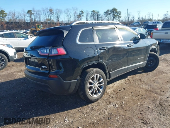 2019 Jeep Cherokee Latitude Plus with VIN 1C4PJMLB2KD261304, listed as a IAAI auction lot 41877500 with 76,442 mi miles and . Bid and sale history available at DreamBid. Image 4.