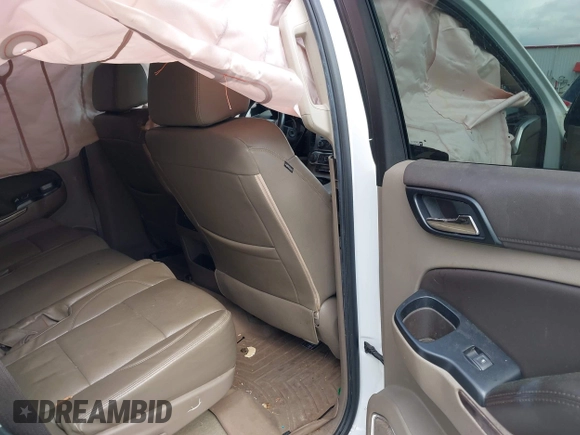 2017 Chevrolet Tahoe LS with VIN 1GNSCAKC5HR312729, listed as a IAAI auction lot 41928484 with 206,999 mi miles and . Bid and sale history available at DreamBid. Image 8.