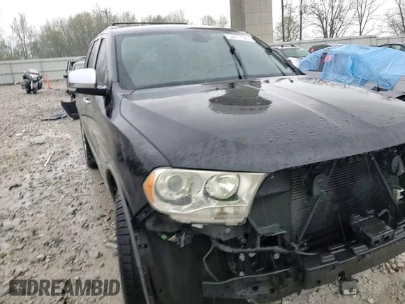 2013 Dodge Durango Citadel with VIN 1C4SDJET0DC616002, listed as a Copart auction lot 54677325 with 174,131 mi miles and Salvage title. Bid and sale history available at DreamBid. Image 14.