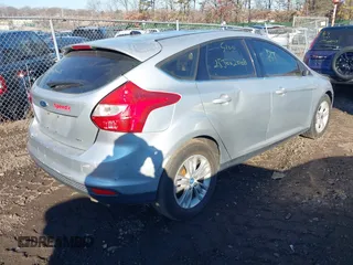 2012 Ford Focus SEL with VIN 1FAHP3M28CL162768, listed as a IAAI auction lot 41682973 with 999,999 mi miles. Bid and sale history available at carsss.com. Image 4.