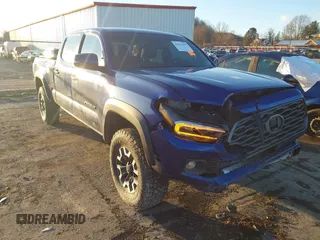 2023 Toyota Tacoma SR5 z VIN 3TMDZ5BN5PM157057, wystawiony jako IAAI lot #41216652 z przebiegiem 22 858 mil mil oraz . Historia ofert i sprzedaży dostępna na DreamBid. Obrazek 1.