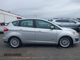 2014 Ford C-Max SEL z VIN 1FADP5BU7EL511677, wystawiony jako IAAI lot #40554962 z przebiegiem 63 031 mil mil oraz . Historia ofert i sprzedaży dostępna na DreamBid. Obrazek 12.