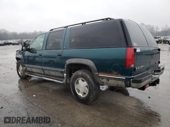 1995 GMC Suburban z VIN 1GKFK16K0SJ748087, wystawiony jako Copart lot #85121834 z przebiegiem 191 550 mil mil oraz Szkoda całkowita • Salvage title. Historia ofert i sprzedaży dostępna na DreamBid. Obrazek 2.