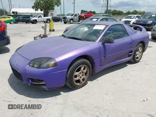 1999 Mitsubishi 3000GT z VIN JA3AM44H8XY003108, wystawiony jako IAAI lot #42374035 z przebiegiem 177 637 mil mil oraz . Historia ofert i sprzedaży dostępna na DreamBid. Obrazek 2.