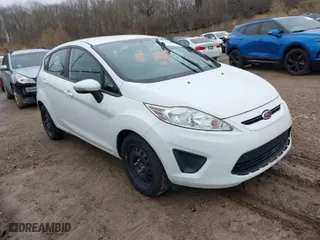 2013 Ford Fiesta SE with VIN 3FADP4EJ8DM193710, listed as a IAAI auction lot 42020003 with 95,625 mi miles. Bid and sale history available at carsss.com. Image 1.
