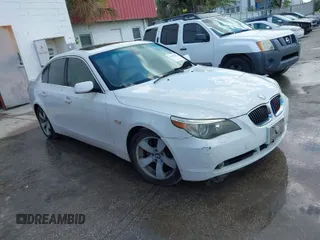 2007 BMW 5 Series 530i with VIN WBANE73587CM49651, listed as a IAAI auction lot 41901010 with 146,053 mi miles. Bid and sale history available at carsss.com. Image 1.