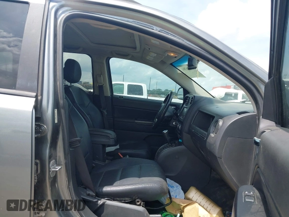 2011 Jeep Compass Latitude with VIN 1J4NT1FB4BD246549, listed as a IAAI auction lot 42156761 with 232,739 mi miles. Bid and sale history available at carsss.com. Image 5.