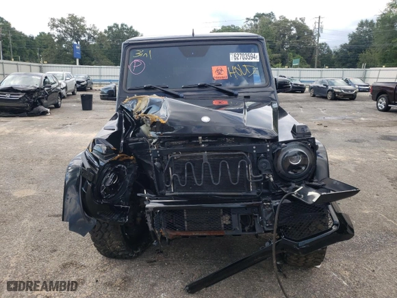 2014 Mercedes-Benz G-Class G 550 with VIN WDCYC3HF2EX214663, listed as a Copart auction lot 62703594 with 104,644 mi miles and Salvage Title. Bid and sale history available at carsss.com. Image 5.