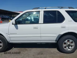2001 Isuzu Rodeo S with VIN 4S2CK58W614332181, listed as a IAAI auction lot 42585130 with 196,497 mi miles and . Bid and sale history available at DreamBid. Image 14.