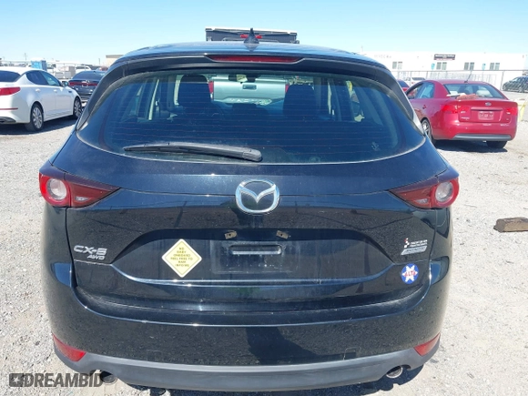 2017 Mazda CX-5 Sport with VIN JM3KFBBL2H0144792, listed as a IAAI auction lot 41654031 with 77,107 mi miles. Bid and sale history available at carsss.com. Image 16.