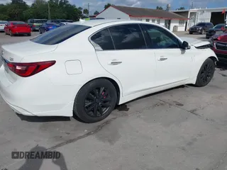 2021 Infiniti Q50 Pure with VIN JN1EV7APXMM702002, listed as a IAAI auction lot 41947553 with 41,654 mi miles and . Bid and sale history available at DreamBid. Image 4.